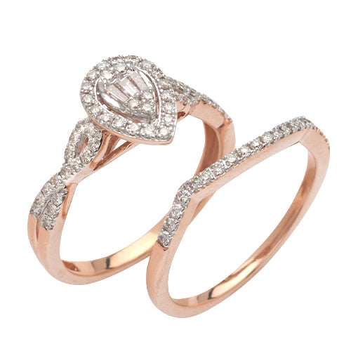 14KR 0.60CTW BAGUETTE AND ROUND DIAMOND PEAR