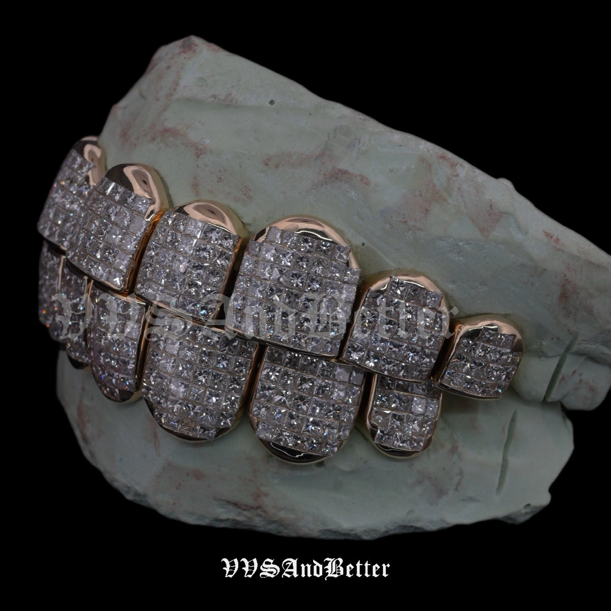Hand-set natural diamond invisible set grillz, left side view