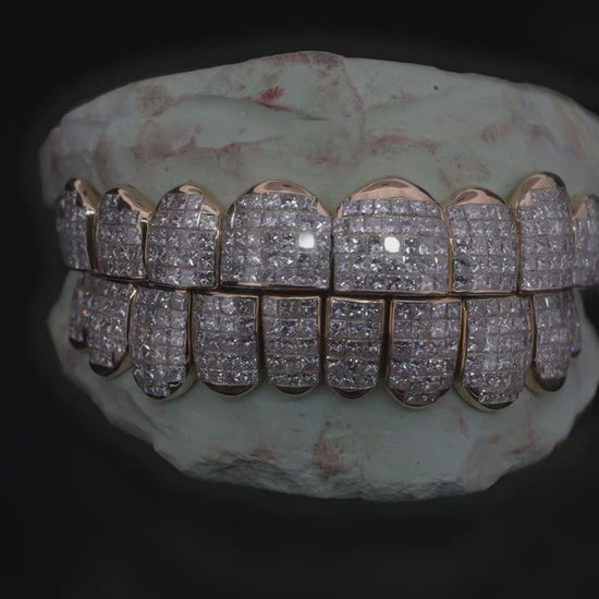 Hand set natural VVS diamond invisible setting grillz in 14KT solid gold by VVSANDBETTER